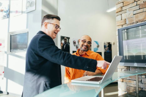 unknown person using laptop